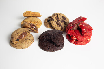 Chocolate chip cookies isolated on white background. Sweet dessert biscuits. Homemade pastry. Red velvet cookies on White Background. Top close shot.