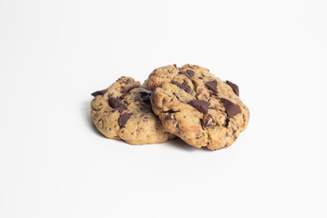 Chocolate chip cookies isolated on white background. Sweet dessert biscuits. Homemade pastry. Top close shot.