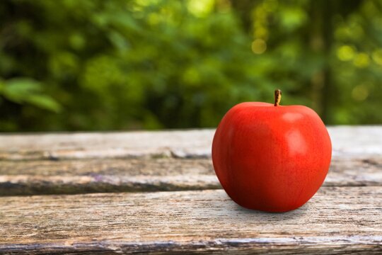 Fresh ripe sweet apple fruit on the desk