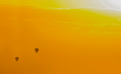 Hot air balloons in the evening sky 