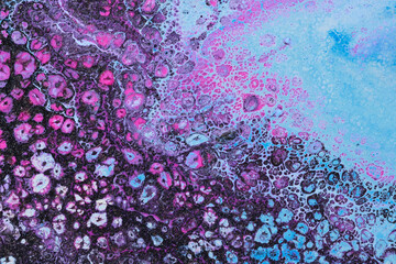 Photography of abstract pink floating paints texture for background