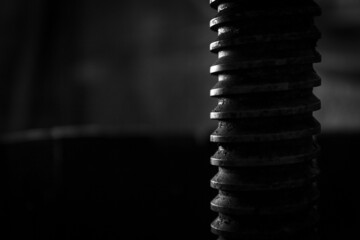 Close up silhouette of helical screw of a winepress