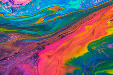 Fototapeta na wymiar Bright creative texture made by floating paints. Macro photography of flowing inks