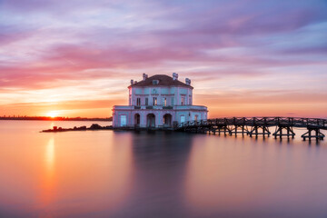Water Reflection of Pink Sunset with Fantasy Architecture