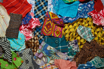 Various scraps of tissue, multicolored pieces of fabric, diversity concept