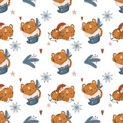 Fototapeta premium Seamless pattern sleeping tiger cubs in a New Year sock with a branch of the Christmas tree