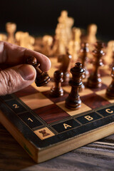Chess figures on chessboard on retro background, Queen gambit