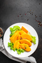 pumpkin salad vitamin slices fresh meal snack on the table copy space food background rustic. top view veggie vegan or vegetarian food
