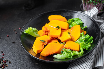 pumpkin salad vitamin slices fresh meal snack on the table copy space food background rustic. top view veggie vegan or vegetarian food