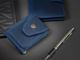 Handmade genuine leather money clip with pen and notepad top view