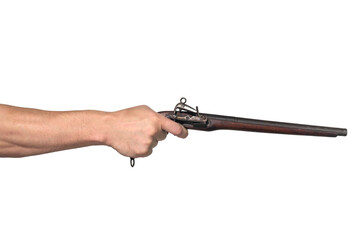 Man's hand holds a old style brown pistol, isolated on a white background