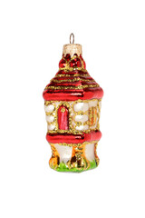 Vintage glass toy for decoration of Christmas tree. Fairy house on chicken legs. Close-up, isolated on white background for your design.