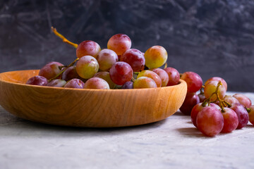 fresh grapes on concrete background