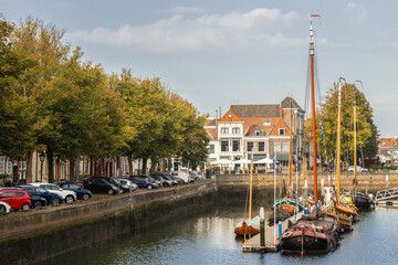 Old sailing ships in the harbor of the picturesque town of Zierikzee in the province of Zeeland, Netherlands.