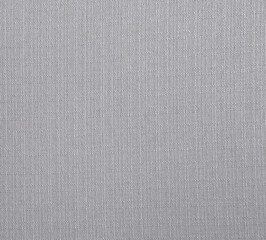 Fototapeta na wymiar Woven upholstery fabric in grey scale for use as a background.