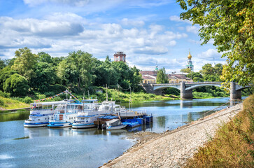 Fototapeta premium Motor ships at the pier on the river in Vologda on a summer sunny day