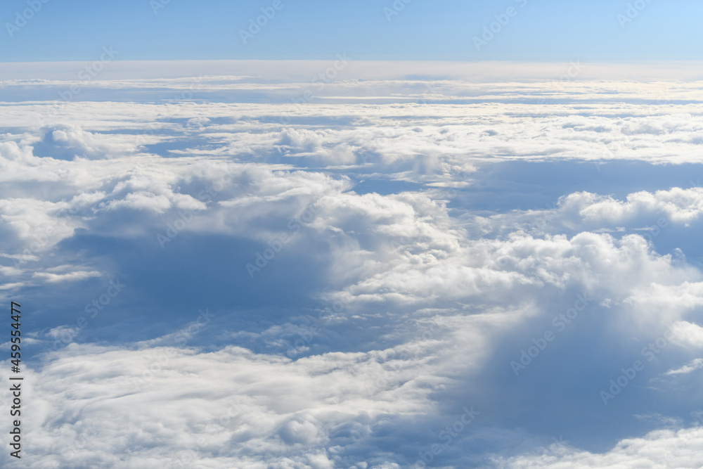 Canvas Prints Clouds and sky as seen through window of an aircraft