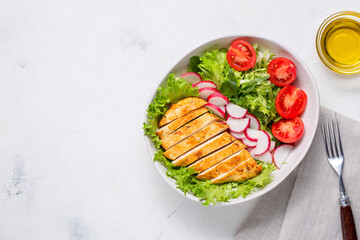 Salad with Chicken fillet. Keto diet, healthy food, diet lunch. Top view on white background.