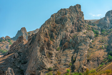 Mountain landscape on a blue sky background