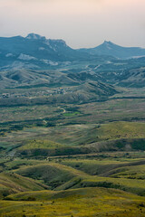 Scenic mountain landscape at sunset. Colorful travel background.