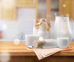 Pure milk drinks in clear jars and bottles, naturally healthy foods