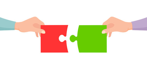 Hands connecting jigsaw puzzle. Business concept. Symbol of teamwork, cooperation, partnership