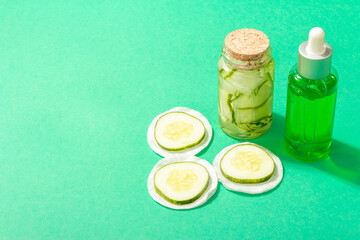 Homemade cucumber cosmetics. Detoxification skin vegetable masks. Natural face lotion, and tonic water
