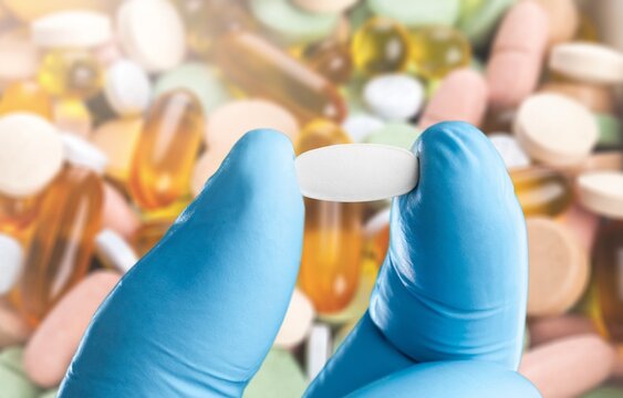 Collection of pill medication on table medical concept