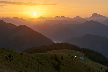 Scenic sunrise above a beautiful mountain range. Moutain range during sunrise.