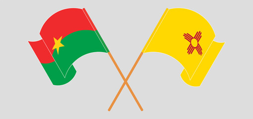Crossed and waving flags of Burkina Faso and the State of New Mexico
