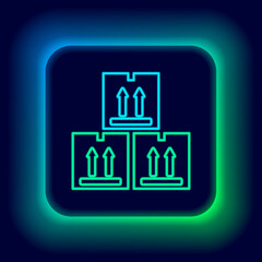 Glowing neon line Cardboard box with traffic symbol icon isolated on black background. Box, package, parcel sign. Delivery, transportation and shipping. Colorful outline concept. Vector