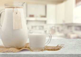 Pure milk drinks in clear jars and bottles, naturally healthy foods