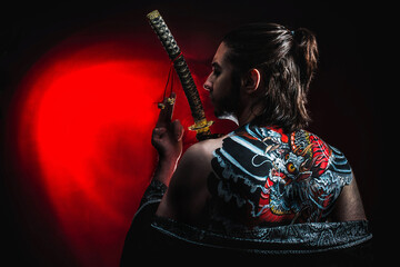 yakuza with dragon tattoo on back