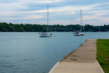 Sailboat anchored in the bay of the Niagara River near Lake Ontario in Canada