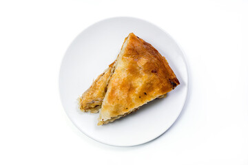 Burek Traditional Pie With Meat Served On The Plate. Traditional Balkan breakfast. Isolated on white background with clipping path included. Top View