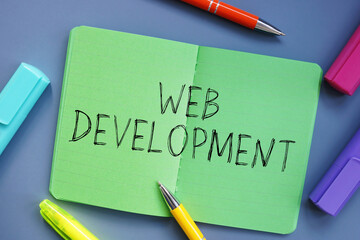  Web Development phrase on the piece of paper.