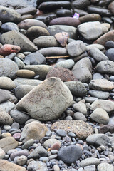 Stacked Beach stones and pebble texture for industrial background