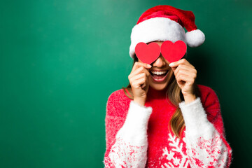 Fun beautiful woman with a christmas hat