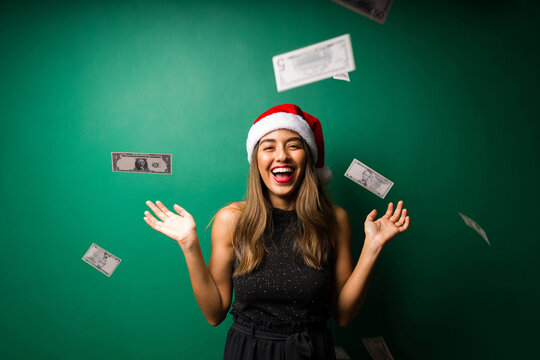 Excited Woman Throwing Money In The Air