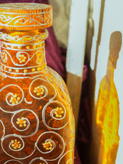 Decorated glass bottle with floral motifs