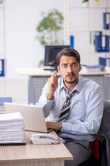 Young businessman employee working in the office