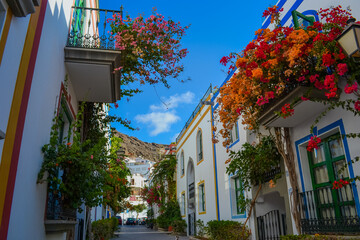 Fototapeta na wymiar Spain, Gran Canaria, 18.09.2021: Streets of a popular tourist destination (Mogan) in Italian style 