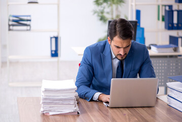 Young businessman employee working in the office