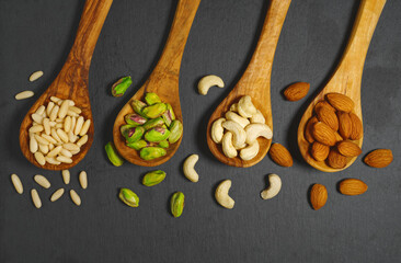 Assorted Mixed Nuts In Wooden Spoons