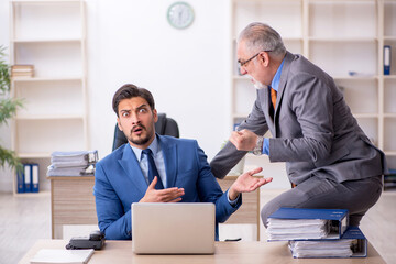 Two colleagues working in the office