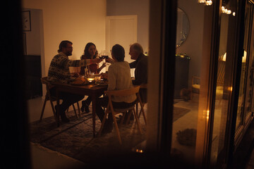Fototapeta na wymiar Family having a Christmas eve dinner