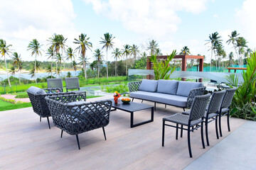 table and chairs in garden, outdoor lounge area, patio furniture set, tropical terrace, garden...