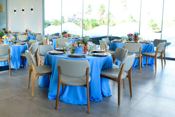 Fototapeta na wymiar tables set in the restaurant, birthday party, table setting, blue november, breakfast 
