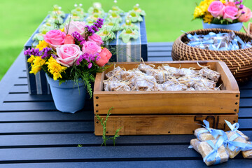 happily married on a wooden tray, ornamental flowers, natural flowers