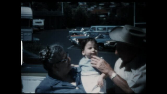 Grandparents With Baby 1974 - Grandparents hold their grandson. 